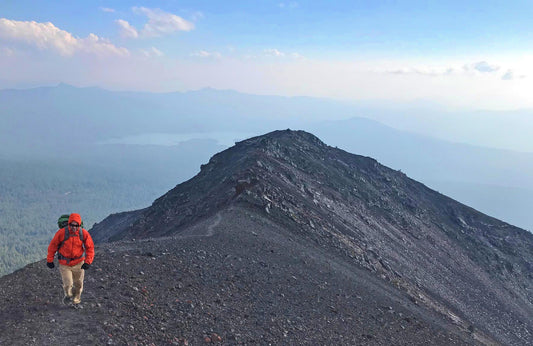 Summiting Diamond Peak in the Diamond Peak Wilderness, Oregon.